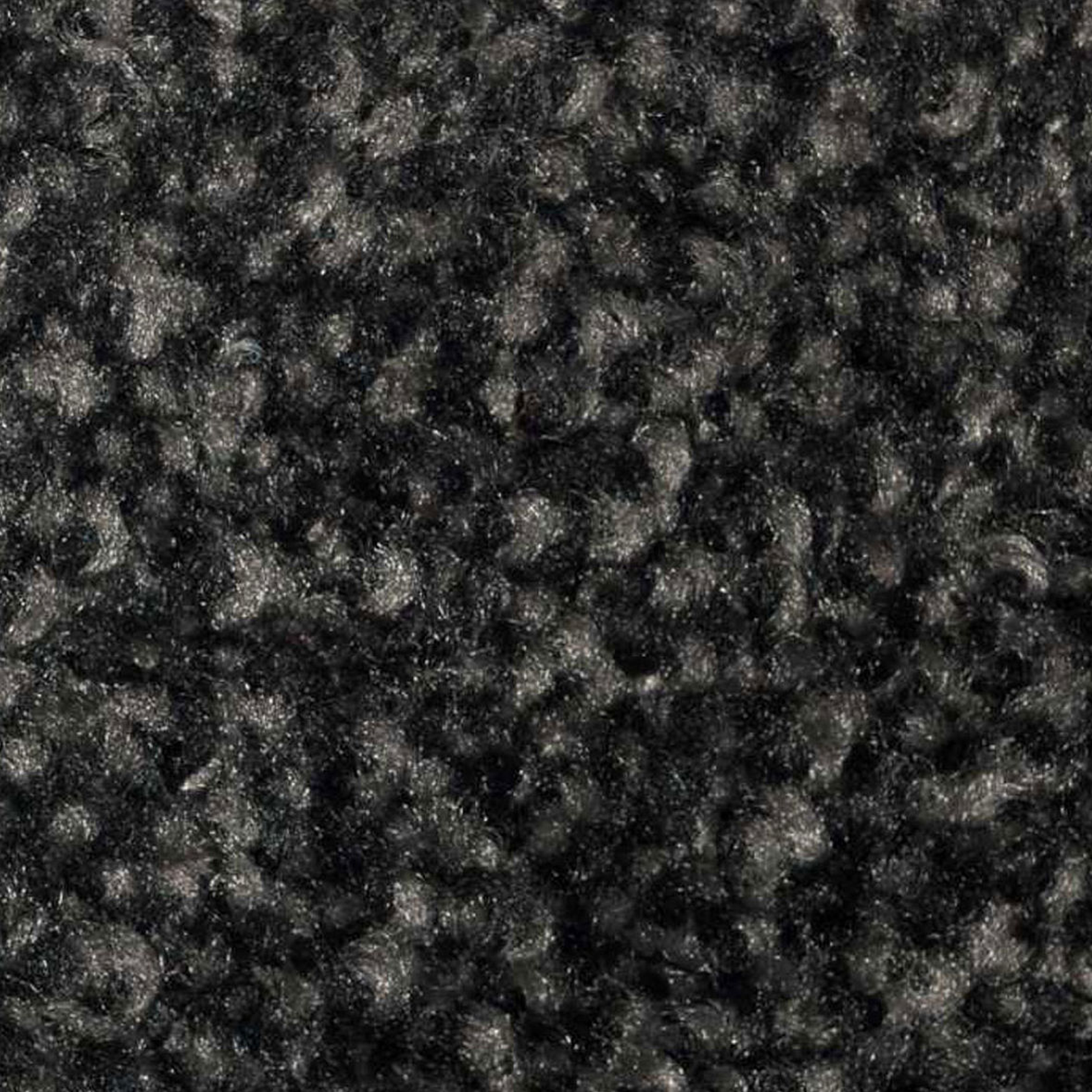 Car Protector Set Premium - Close up of the fabric surface of a car boot mat