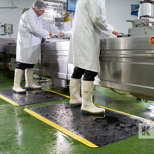 Kleen-Comfort Safety - Anti-fatigue mat in a laboratory area with to lab technicians